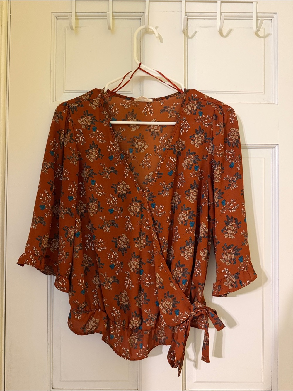 Sienna Sky Rust Floral Wrap Blouse with Blue and Cream Accents